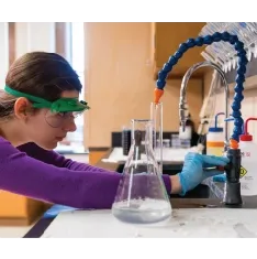 Student in biochemistry lab.